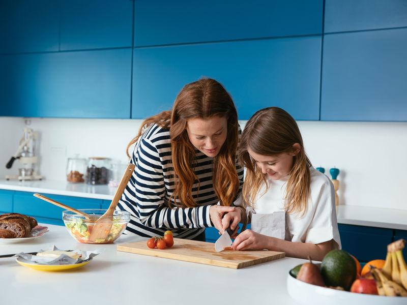 What does a child learn by being involved in activities of daily living?